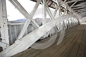 Interior of historic, white covered bridge, Groveton, New Hampshire.