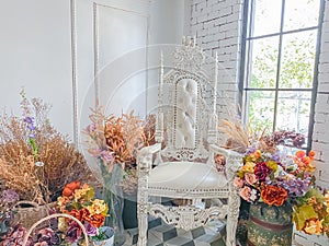 Interior home decor,bouquet and chair with white background.