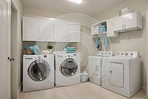 Interior of home laundry room with modern washing machine