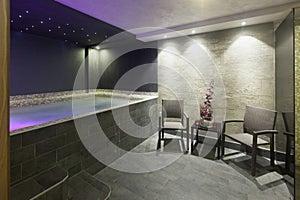 Interior of a hotel spa with jacuzzi bath with ambient lights