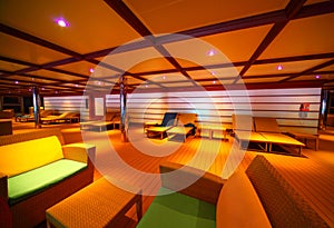 Interior of illuminated hall on cruise ship