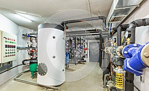 Interior of an industrial boiler house, technological unit with many sensors, indicators and valves