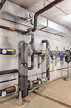 Interior of an industrial boiler house, technological unit with many sensors, indicators and valves