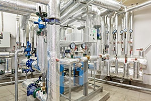 Interior of an industrial boiler house, technological unit with many sensors, indicators and valves