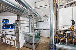 Interior of industrial, gas boiler house with a lot of boilers a