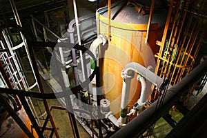 Interior industrial pipe and tank of water treatment plant.