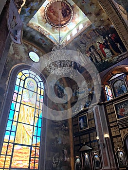 Interior inside the old orthodox Christian church in a Muslim Arab Islamic country with icons, prayers, god murals, ornaments, pai