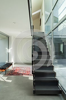 Interior, iron staircase of a modern house