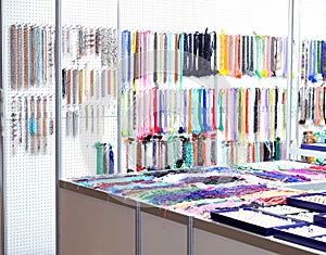 interior of a jewelry store selling colorful glass necklaces