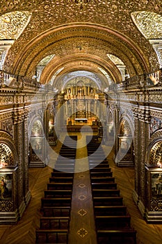 The interior of La Compania Jesuit Church in Quito - Ecuador