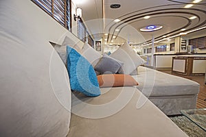 Interior of large salon area of luxury motor yacht