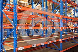 Interior of large warehouse retail store industry. Rack of furniture and home accessories stock storage. Interior of cargo in