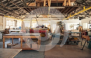 Interior of a large woodworking studio full of machinery