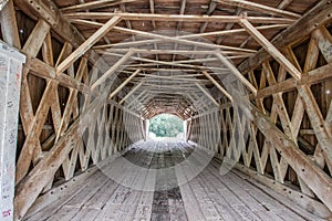 The interior latticework of the Iconic Roseman Covered Bridge, Winterset, Madison County, Iowa, USA