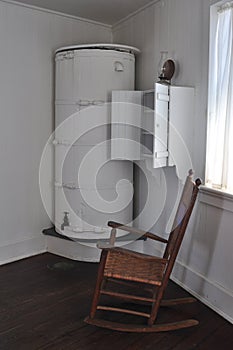 Interior of a lighthouse with rain collection and a Rocking chair