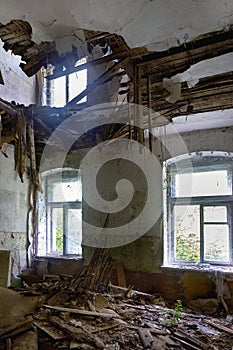 Interior of a living room with a collapsed ceiling