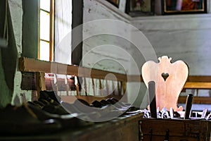 Interior of living room in old traditional rural wooden house.