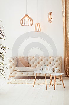 Interior living room with a sofa, table, floor lamp and panoramic window. Beautiful Living room Architecture Stock