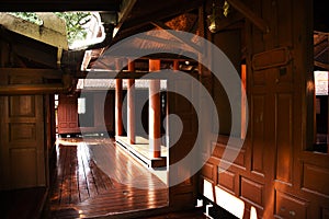 Interior livingroom of ancient wooden house or antique wood home in Khum Khun Phaen garden park in Wat Khae temple for thai people