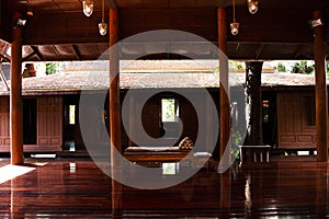 Interior livingroom of ancient wooden house or antique wood home in Khum Khun Phaen garden park in Wat Khae temple for thai people