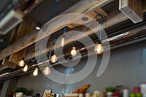 The interior is loft-style with bright lamps of Edison on long cords