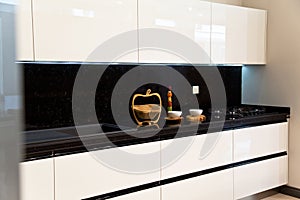 Interior of luxurious modern kitchen white cabinets