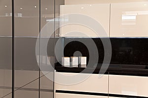 Interior of luxurious modern kitchen white grey cabinets