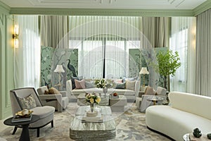 Interior of a luxurious sitting room with bay window sofas and coffee table.
