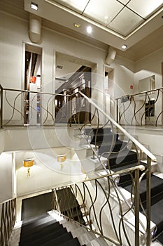 Interior luxury apartment with illuminated stair.