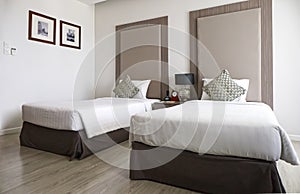 Interior of luxury double beds in hotel bedroom on Mittraphap Road, Nakhon Ratchasima