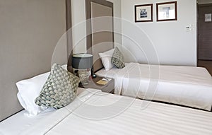 Interior of luxury double beds in hotel bedroom on Mittraphap Road, Nakhon Ratchasima