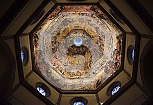 Interior of the majestic octagonal base and completely frescoed Brunelleschi`s dome in the cathedral of Santa Maria del Fiore in F
