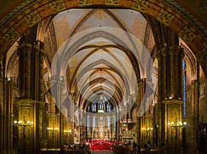 Interior of Matthias Church with choir singing