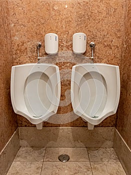 interior of the men's WC with toilet and urinals in the vicinity of the hemicycle in the Portuguese Assembly of the Republic.