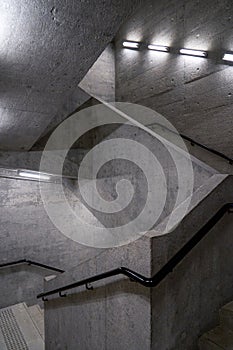 Interior minimalist concrete staircase in Tai Kwun, a historic building in Hong Kong