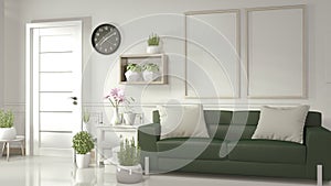 Interior Mock up poster frame in white living room with green sofa and decoration plants on white glossy floor.3D rendering