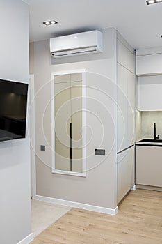 Interior of modern apartment, kitchen. Air conditioner