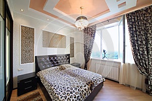 Interior modern bedroom in the Greek style with photo
