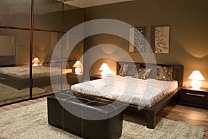 Interior of modern bedroom with mirrors