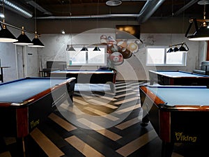 Interior of modern billiard hall.