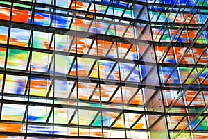 Interior modern building with colorful glass wall