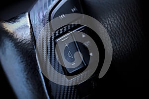 Interior modern car button on steering wheel
