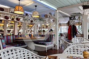 Interior of a modern cozy italian restaurant. Summer terrace