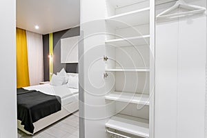Interior of modern empty wardrobe room. Hotel modern standart room. simple and stylish interior. interior lighting
