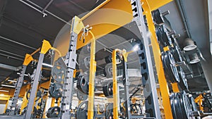 Interior Of Modern Fitness Gym - a lot of modern athletic trainer