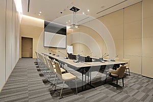 Interior of modern fully equipped professional facilities meeting conference room boardroom classroom office with nobody empty and