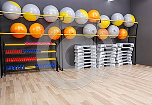 Interior of modern gym with equipment