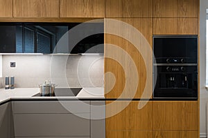 Interior of modern kitchen with built in appliances