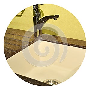 Interior of modern kitchen and ceramic sink and tap