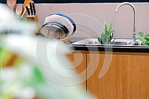 Interior of modern kitchen with sink